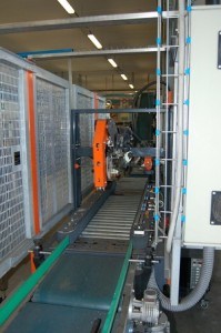 A photo of a carton packaging line