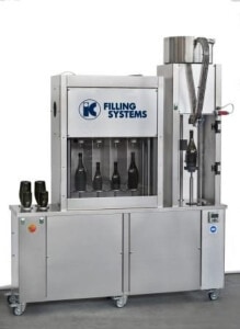 This is a photo of a small bottling machine for beer