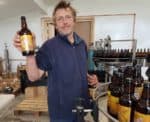 Born in the Borders Brewery Owner John Henderson with the first bottling of Foxy Blonde Beer